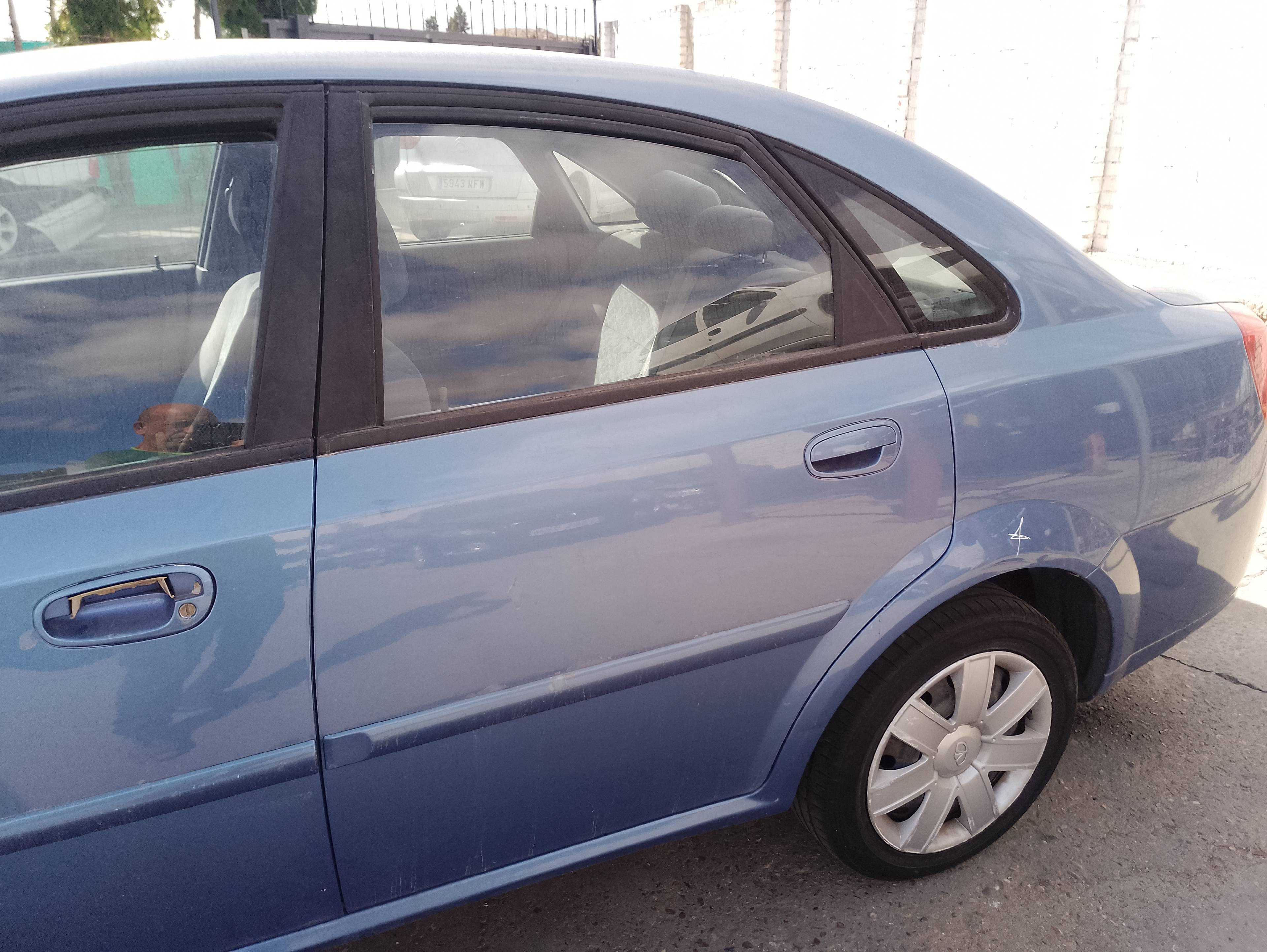 Recambio de puerta trasera izquierda para daewoo nubira berlina se referencia OEM IAM   