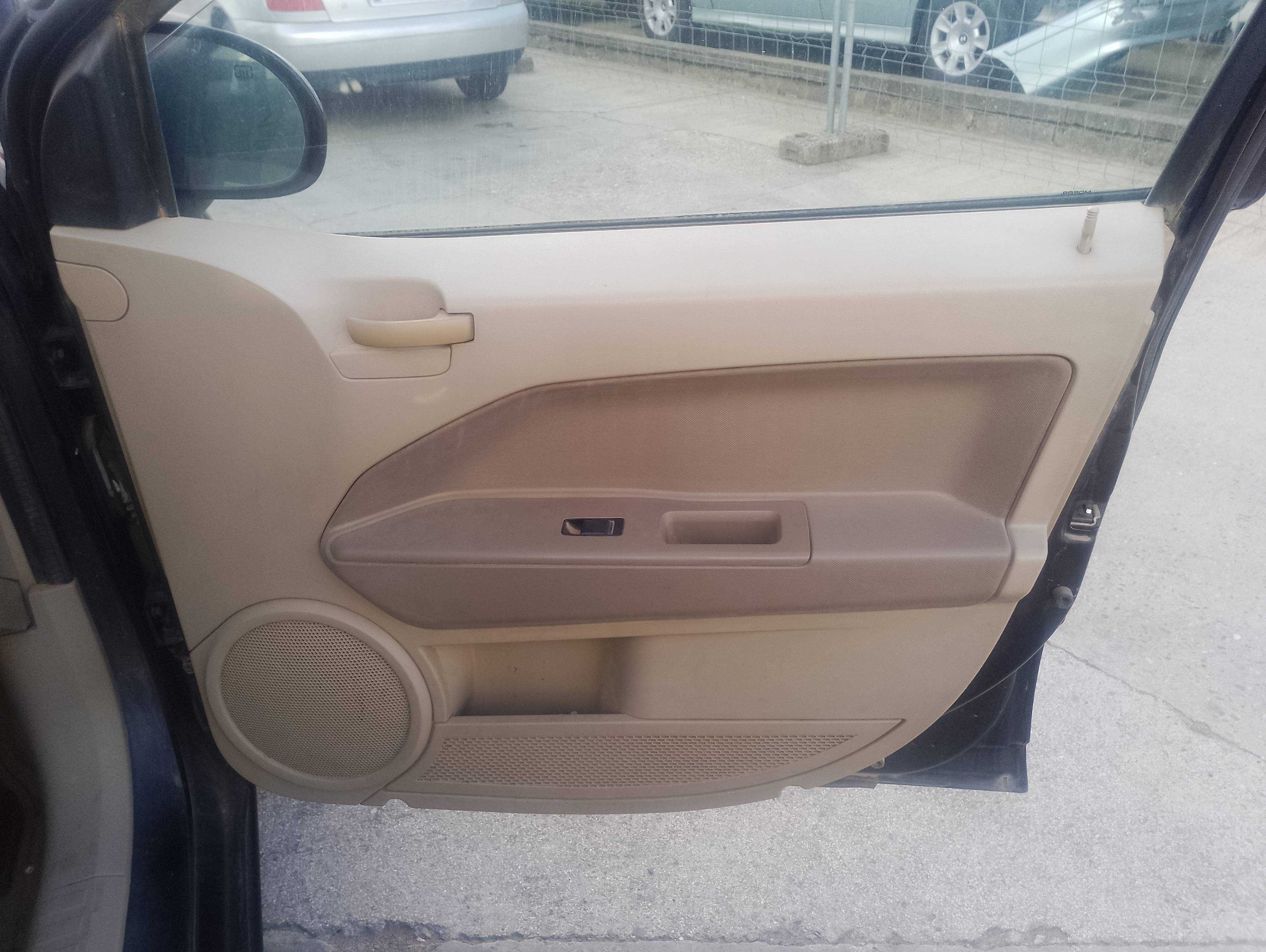 Recambio de guarnecido puerta delantera derecha para dodge caliber s referencia OEM IAM   