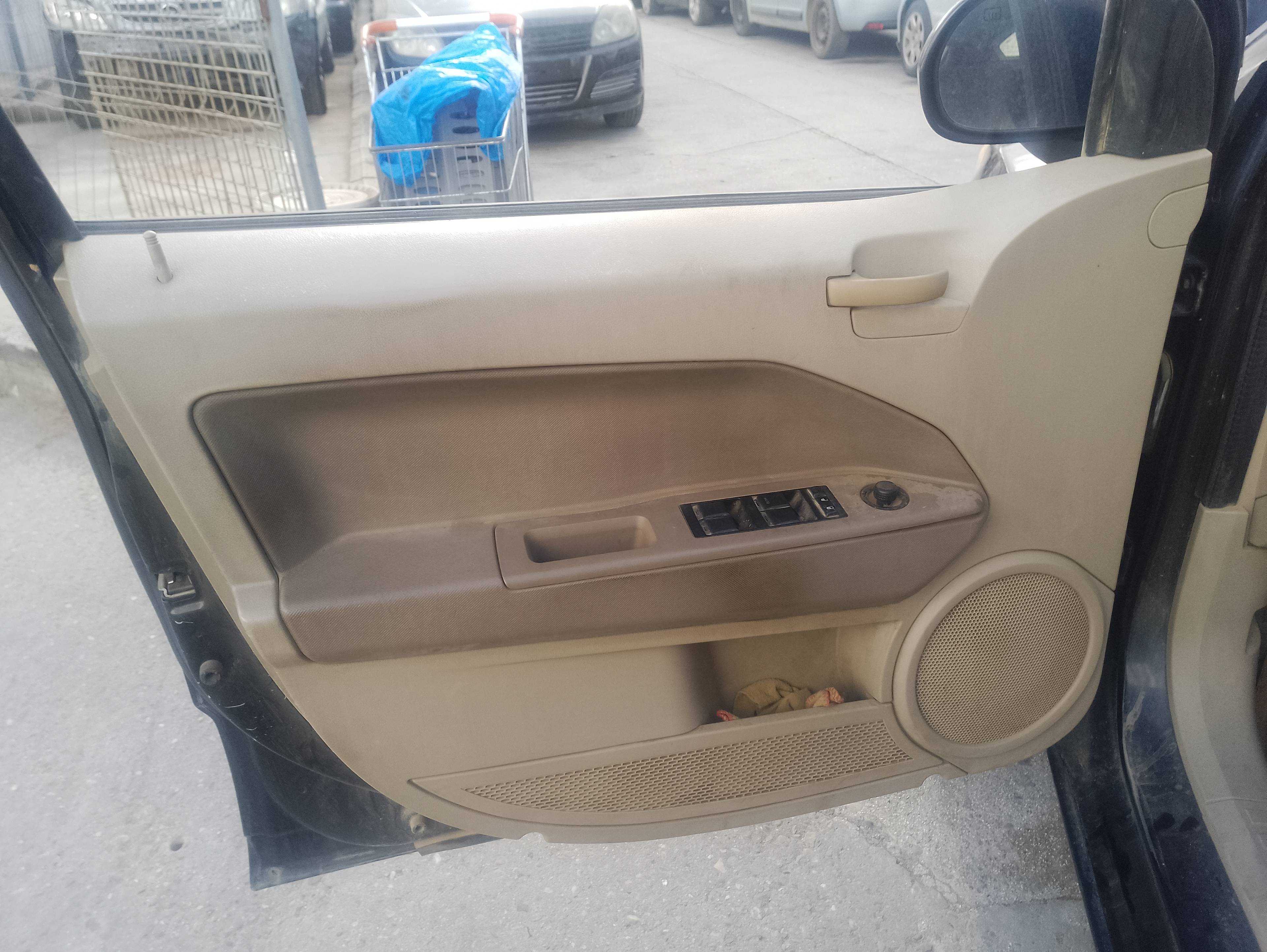Recambio de guarnecido puerta delantera izquierda para dodge caliber s referencia OEM IAM   