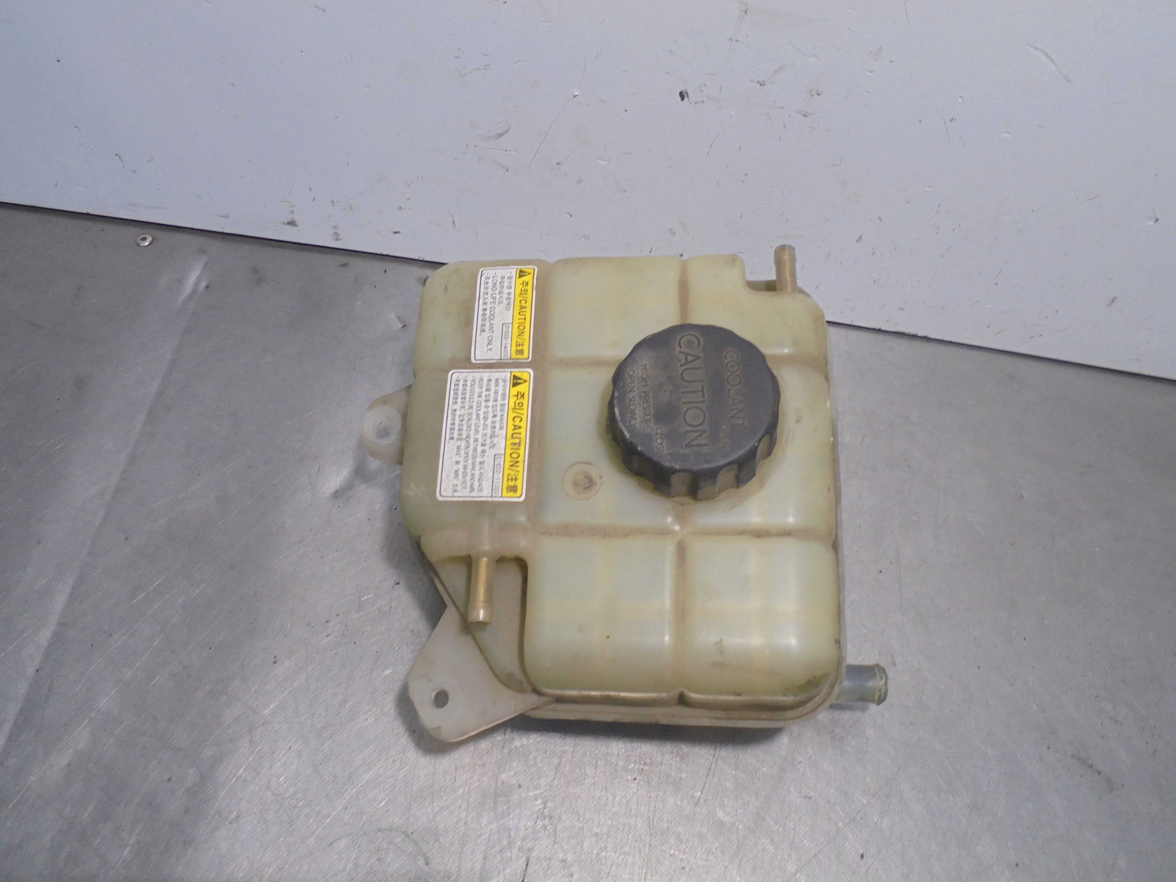 Recambio de deposito expansion para ssangyong korando 2.0 td cat referencia OEM IAM 2161034001  