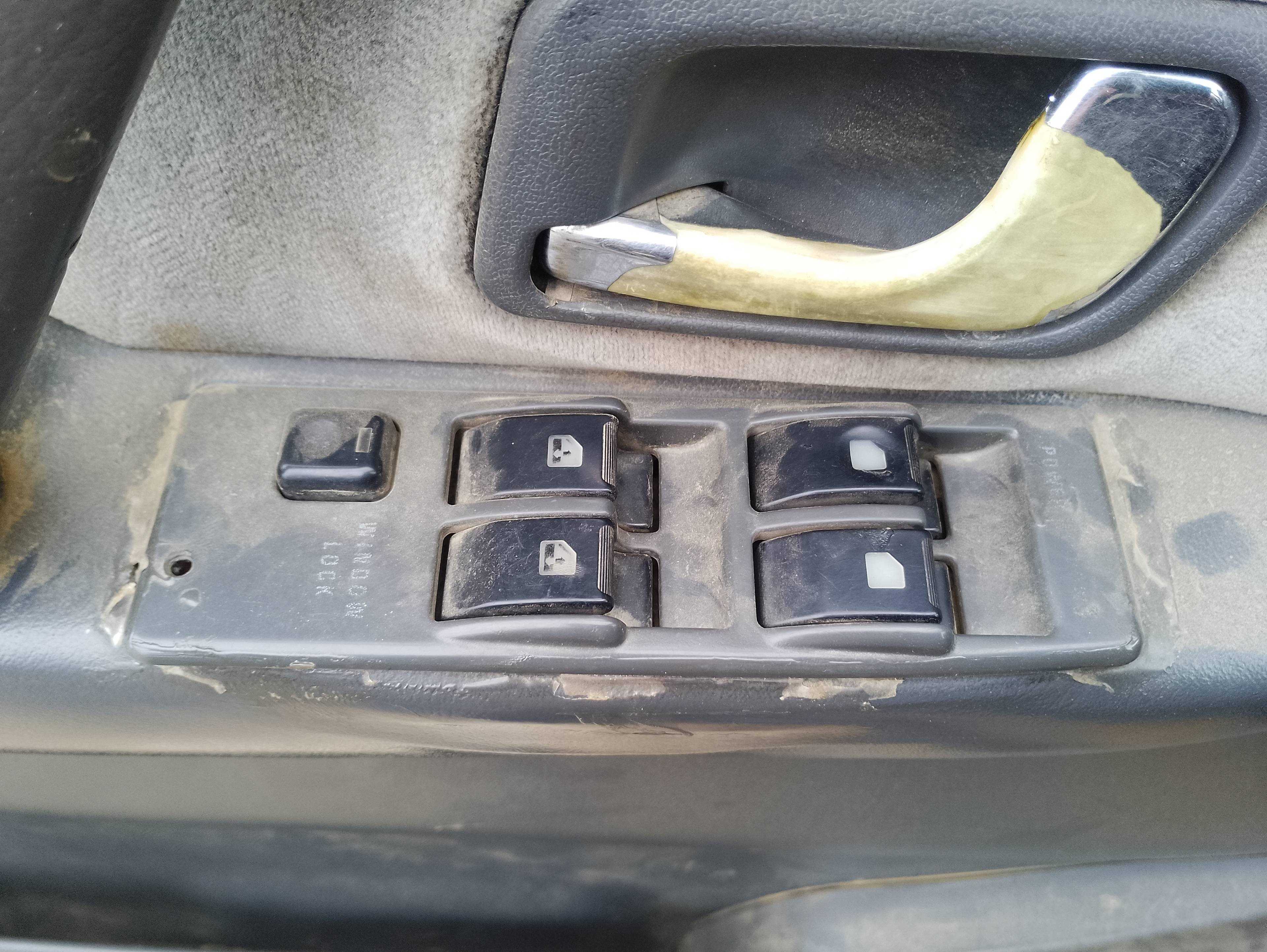 Recambio de mando elevalunas delantero izquierdo para mitsubishi pajero 2.5 turbodiesel referencia OEM IAM   