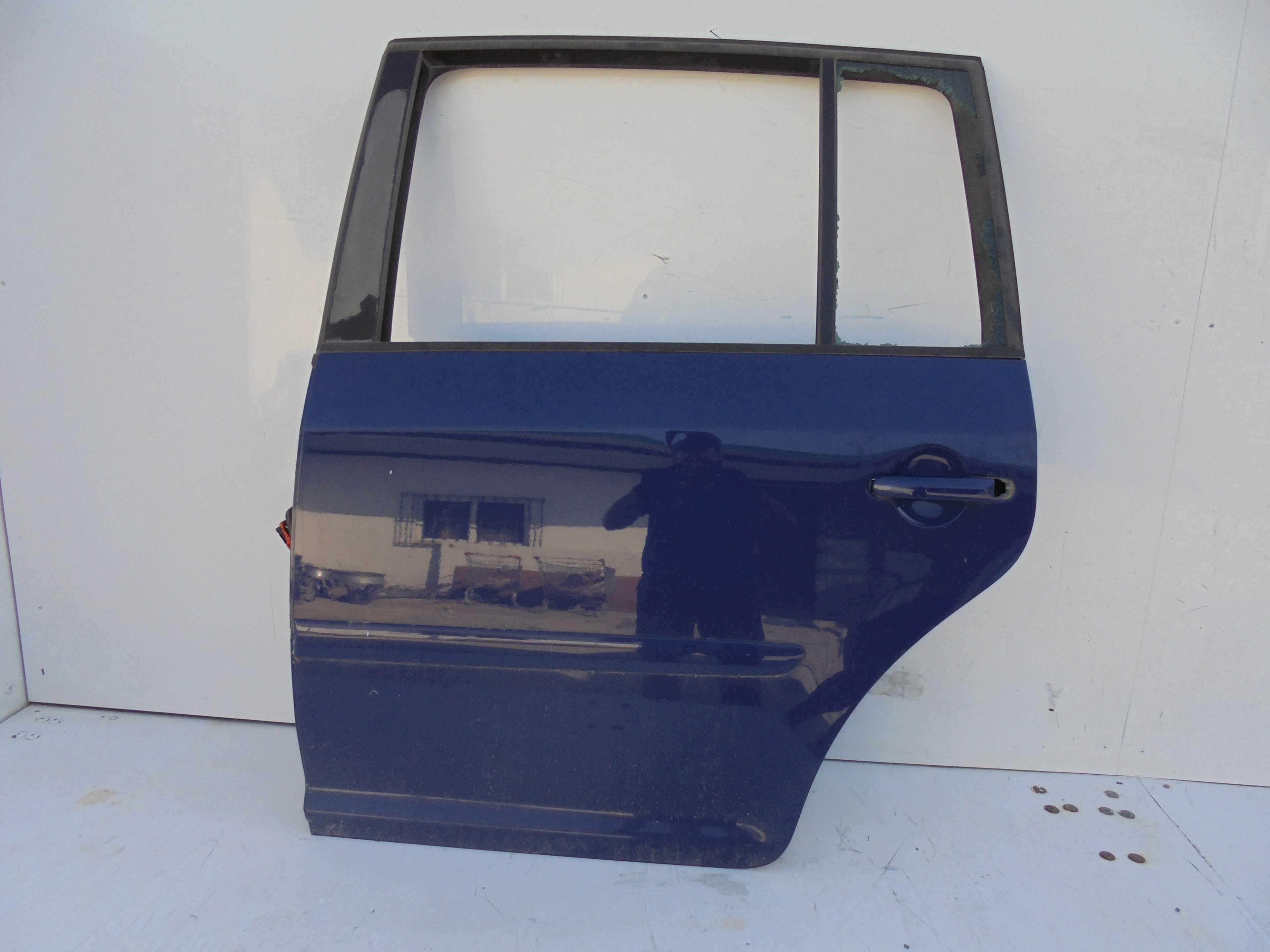 Recambio de puerta trasera izquierda para volkswagen touran (1t1) highline referencia OEM IAM   