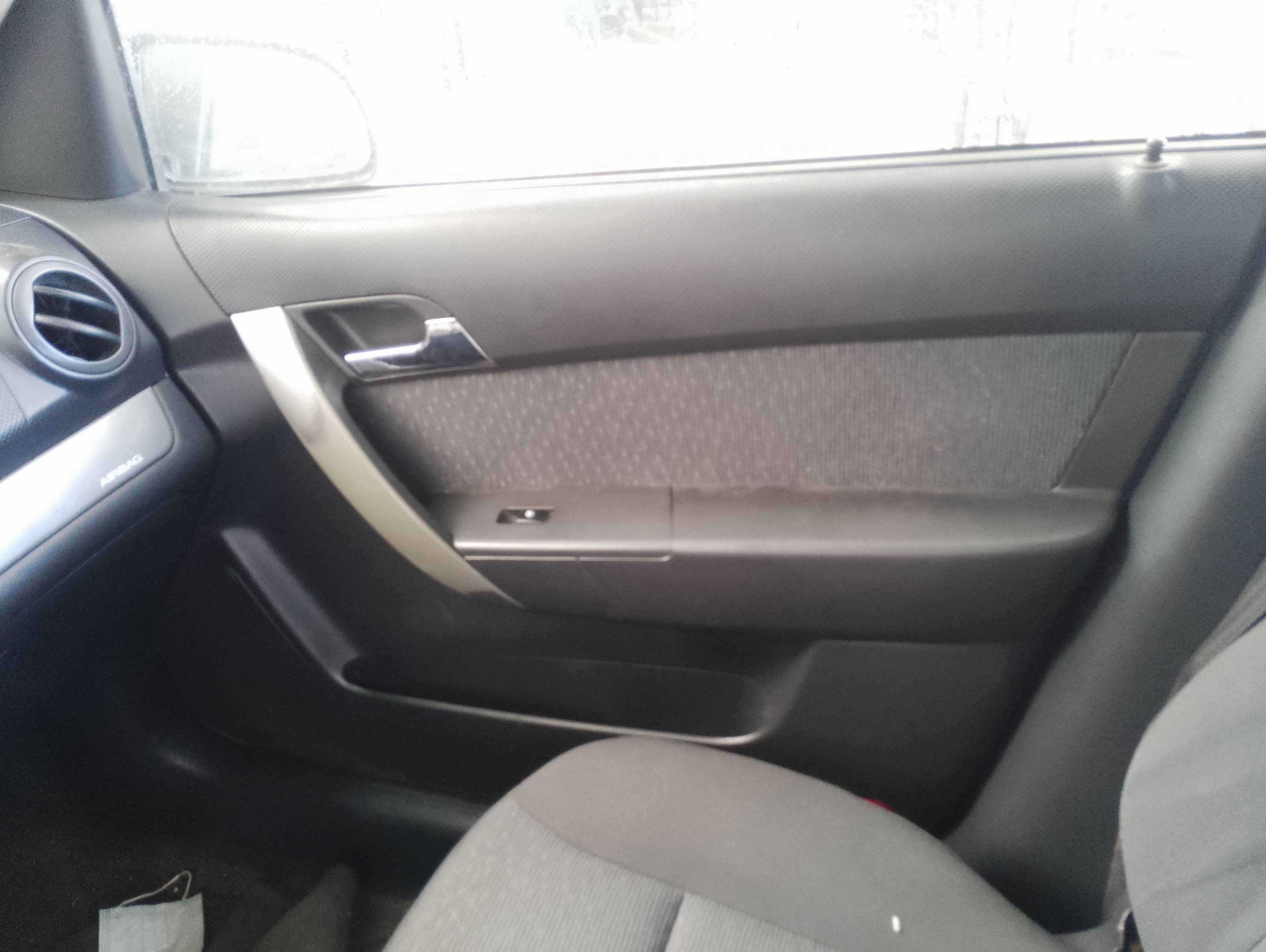 Recambio de guarnecido puerta delantera derecha para chevrolet aveo ls referencia OEM IAM   