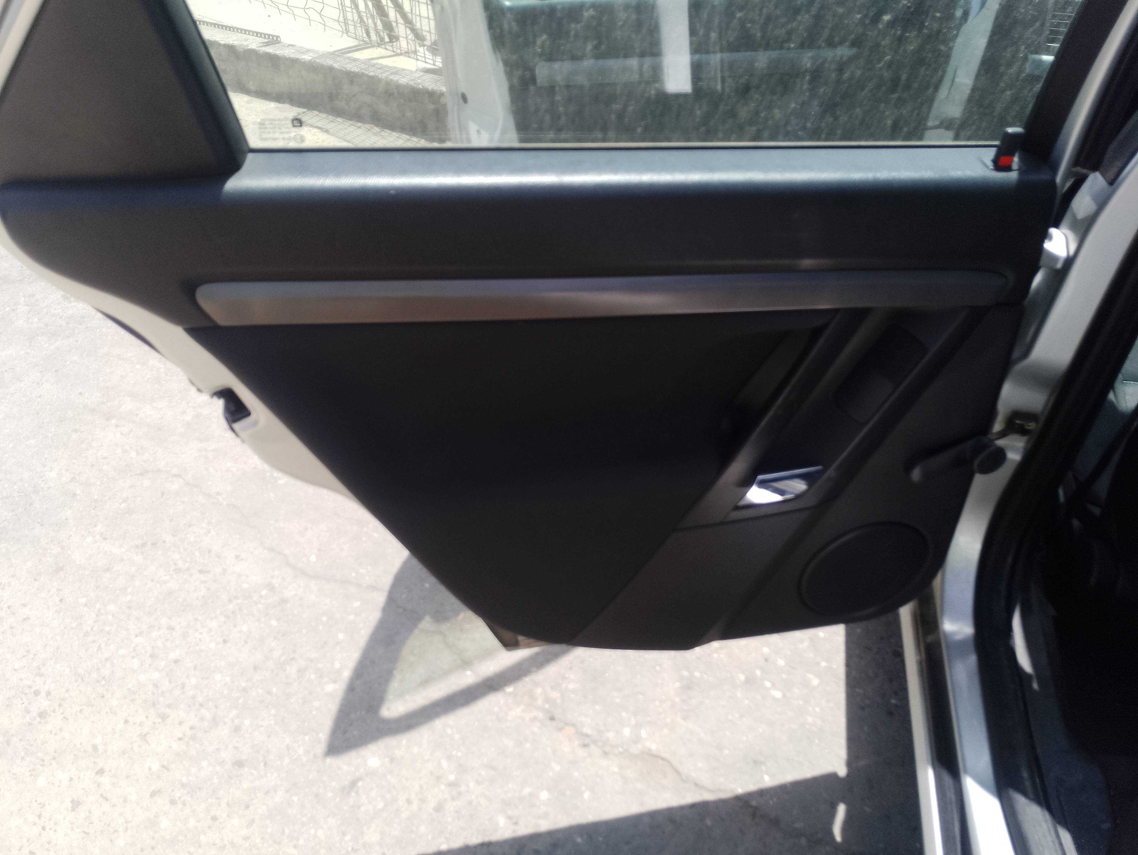 Recambio de guarnecido puerta trasera izquierda para opel vectra c berlina elegance referencia OEM IAM   