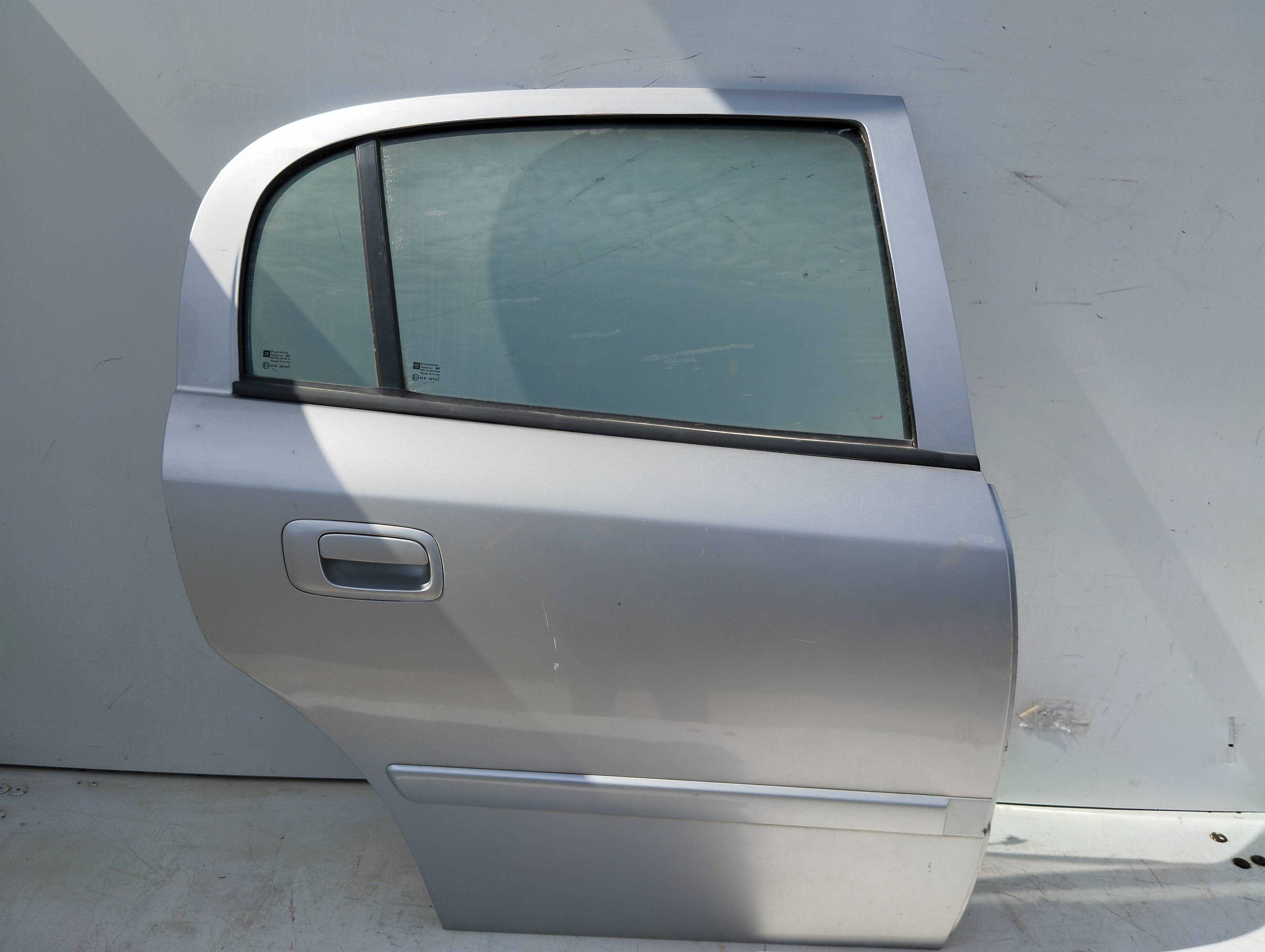Recambio de puerta trasera derecha para opel astra g berlina club referencia OEM IAM   
