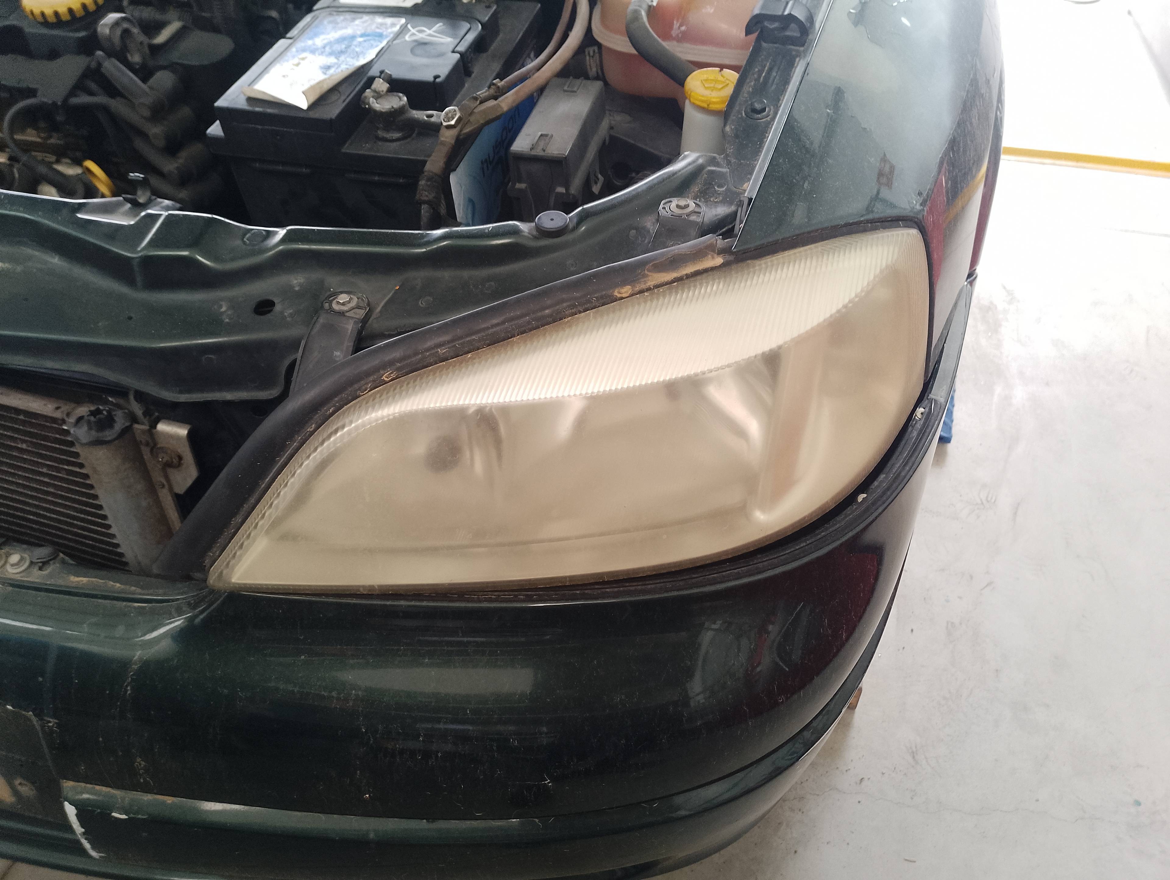 Recambio de faro izquierdo para opel astra g berlina club referencia OEM IAM   