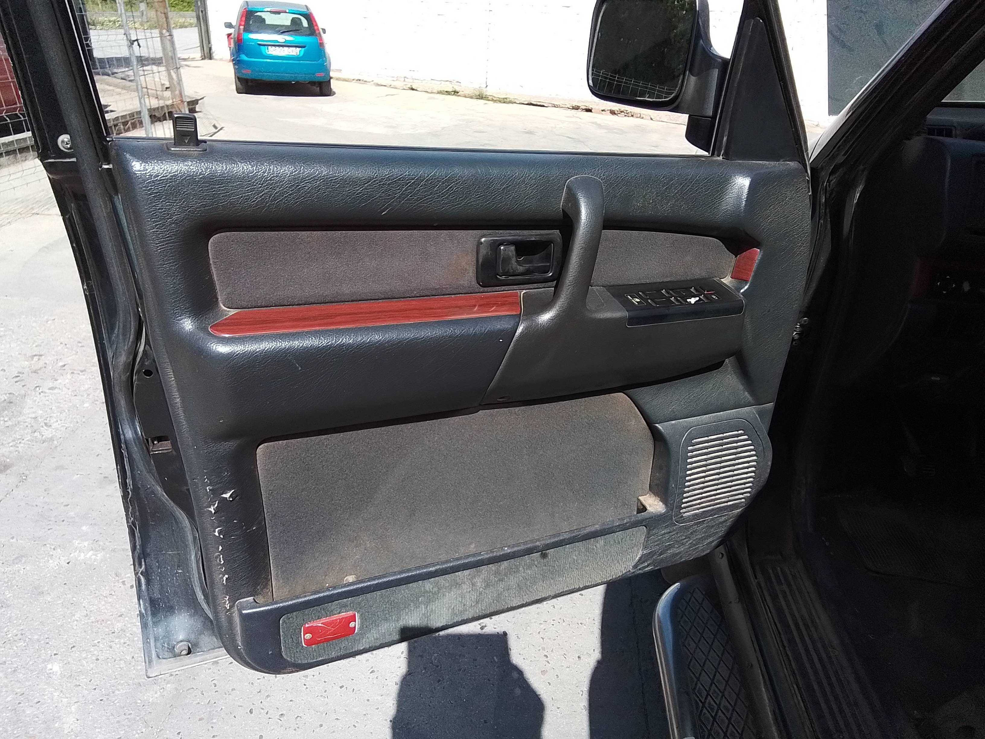 Recambio de guarnecido puerta delantera izquierda para opel monterey básico referencia OEM IAM   