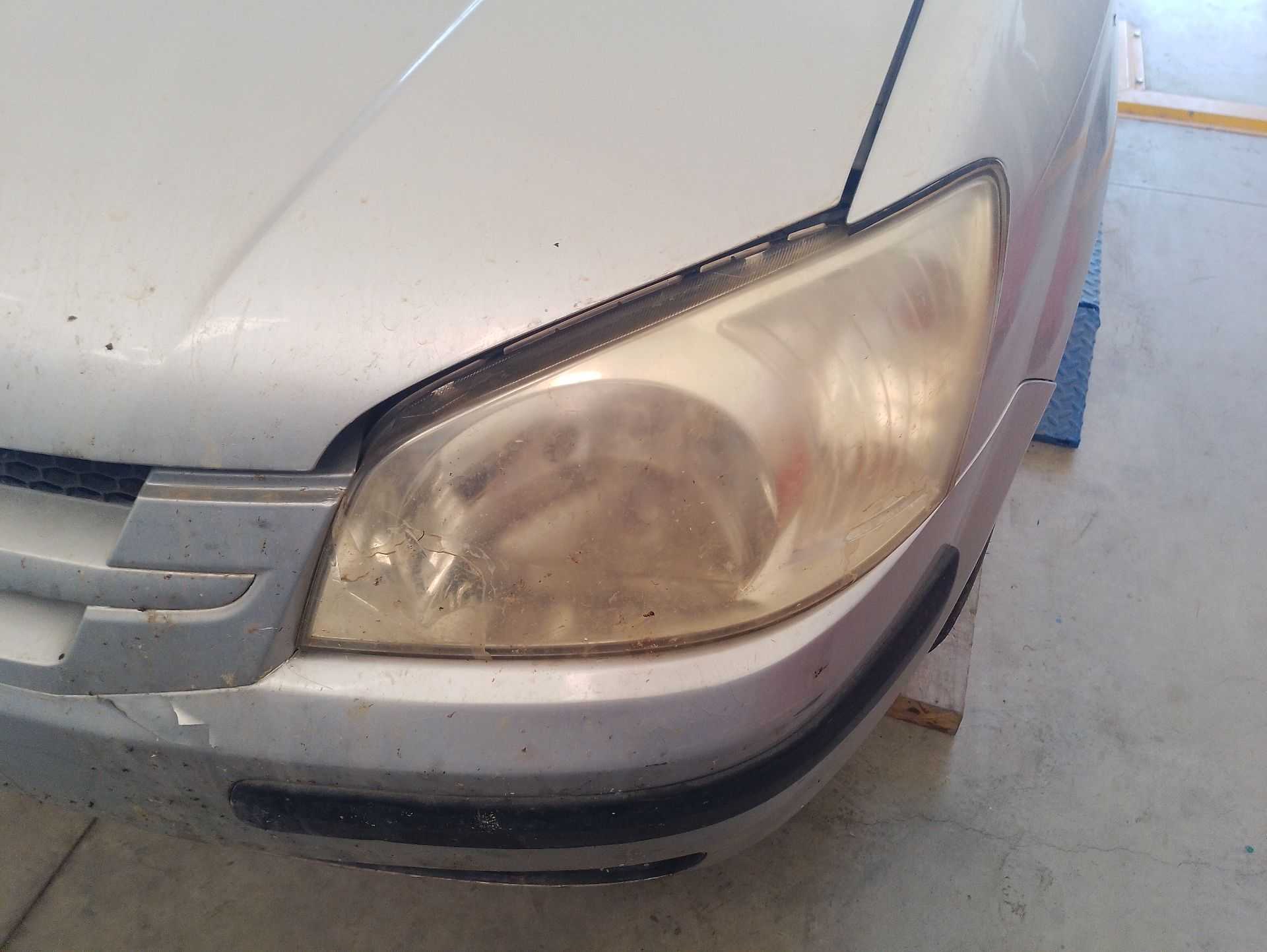 Recambio de faro izquierdo para hyundai getz (tb) 1.3 referencia OEM IAM 921011C030  