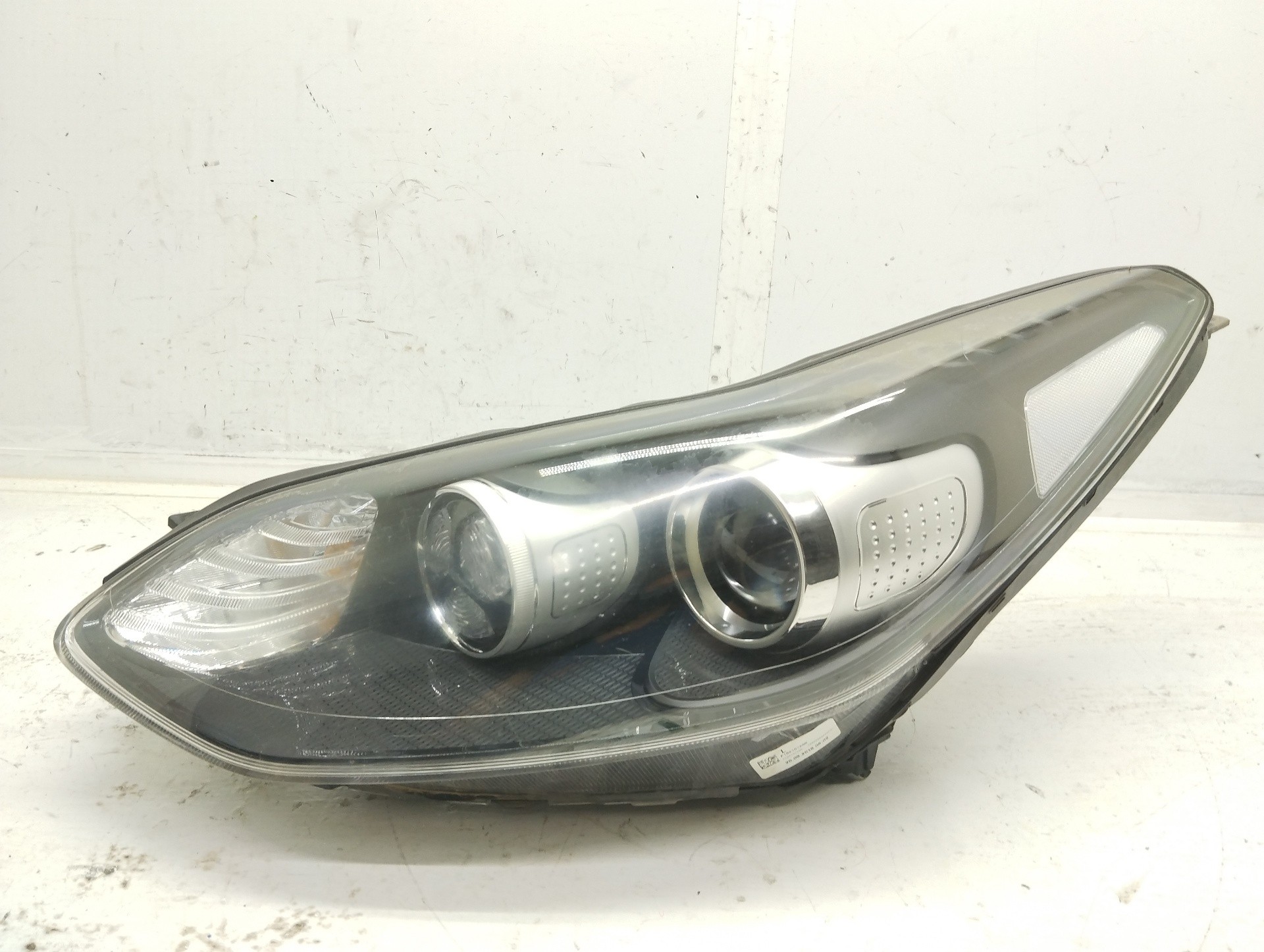 Recambio de faro izquierdo para kia sportage business 2wd referencia OEM IAM 92101F1010  