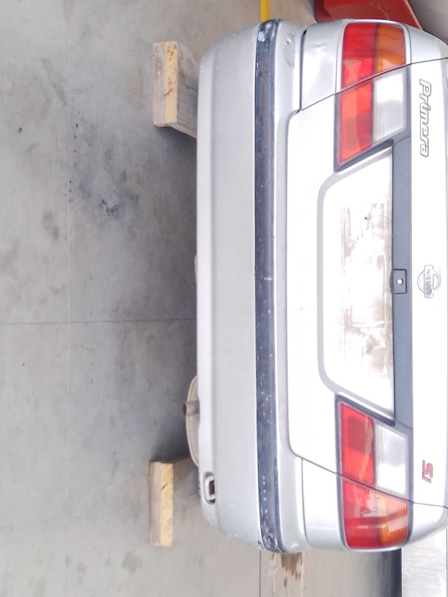 Recambio de paragolpes trasero para nissan primera (p11) 1.6 16v referencia OEM IAM   