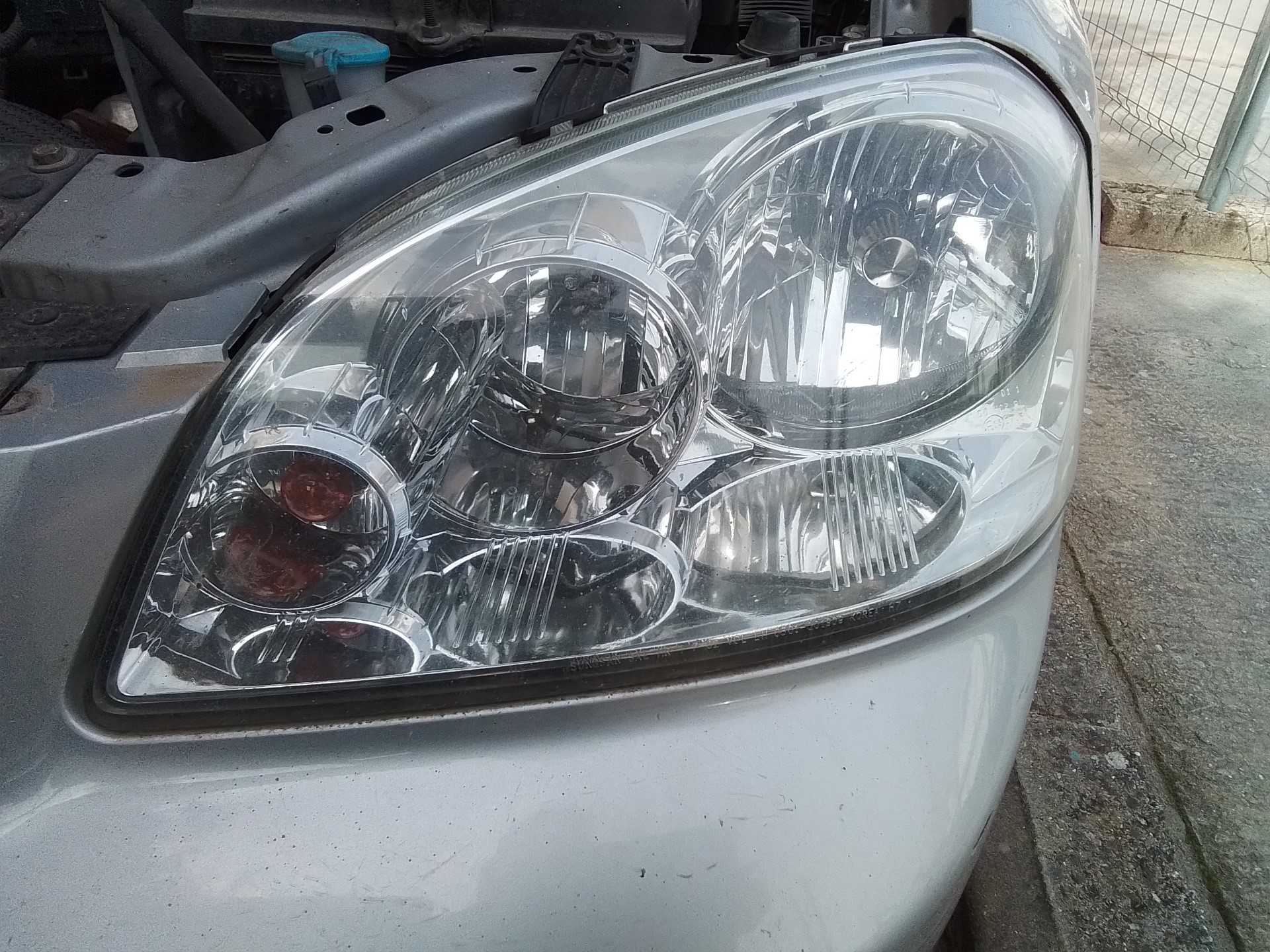 Recambio de faro izquierdo para chevrolet nubira berlina 1.8 cat referencia OEM IAM 0301001915  