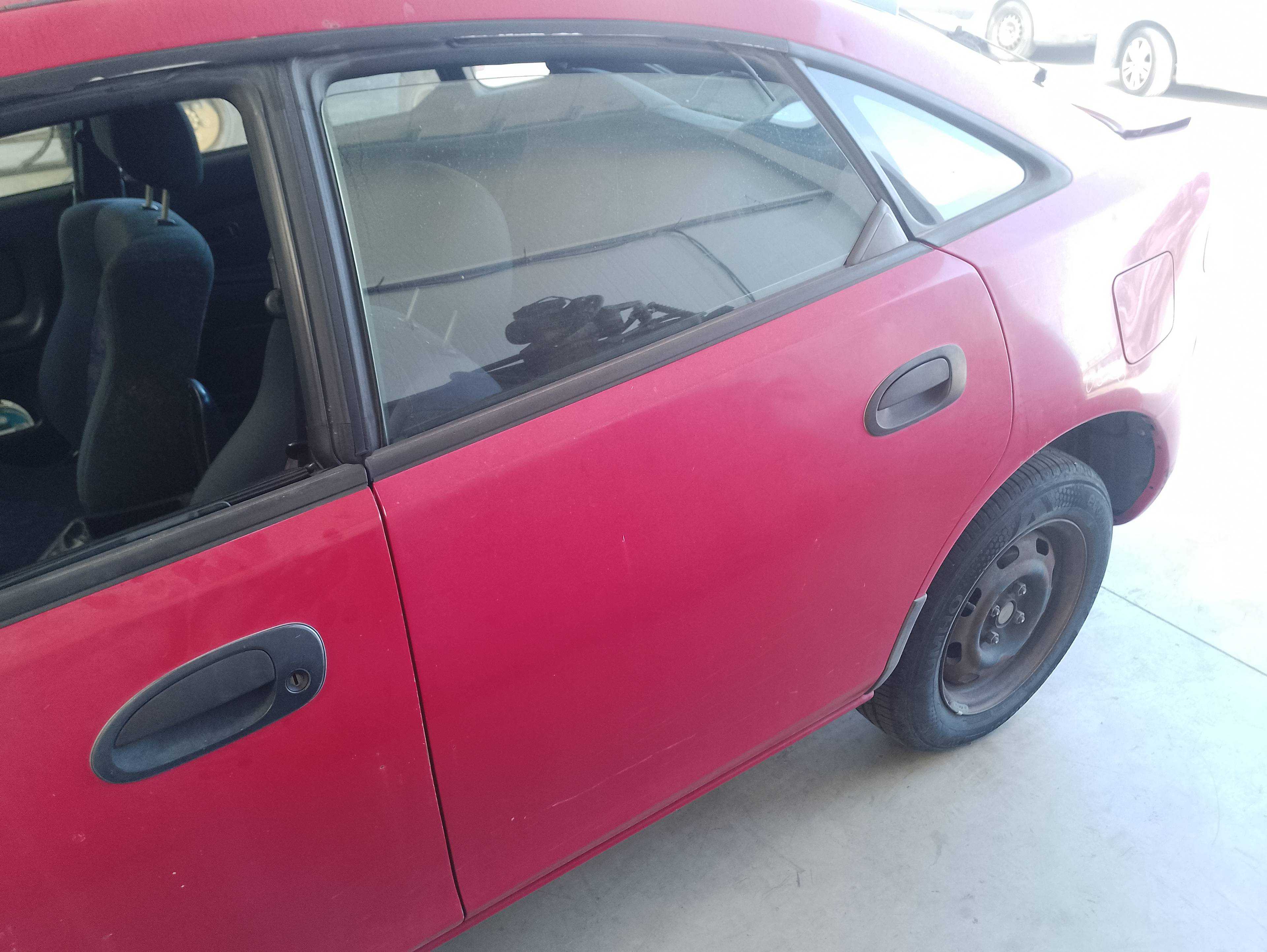 Recambio de puerta trasera izquierda para mazda 323 berlina c/f/s (ba) 1.5 c referencia OEM IAM   