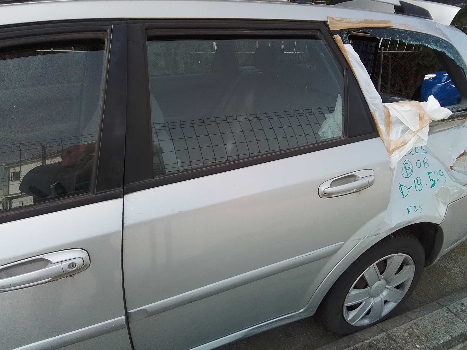 Recambio de puerta trasera izquierda para chevrolet nubira berlina 1.8 cat referencia OEM IAM   