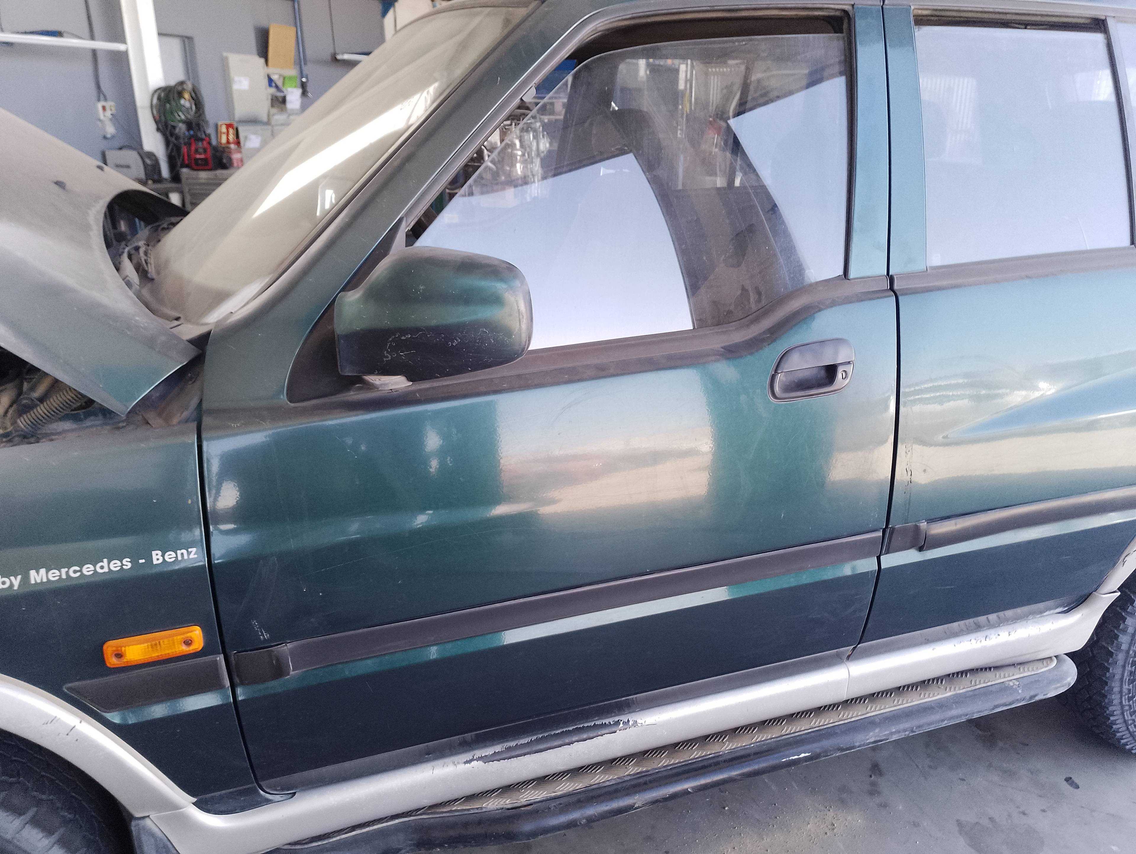 Recambio de puerta delantera izquierda para ssangyong musso 4x4 wagon referencia OEM IAM   