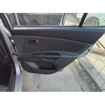 Recambio de guarnecido puerta trasera derecha para kia rio 1.4 cat referencia OEM IAM   