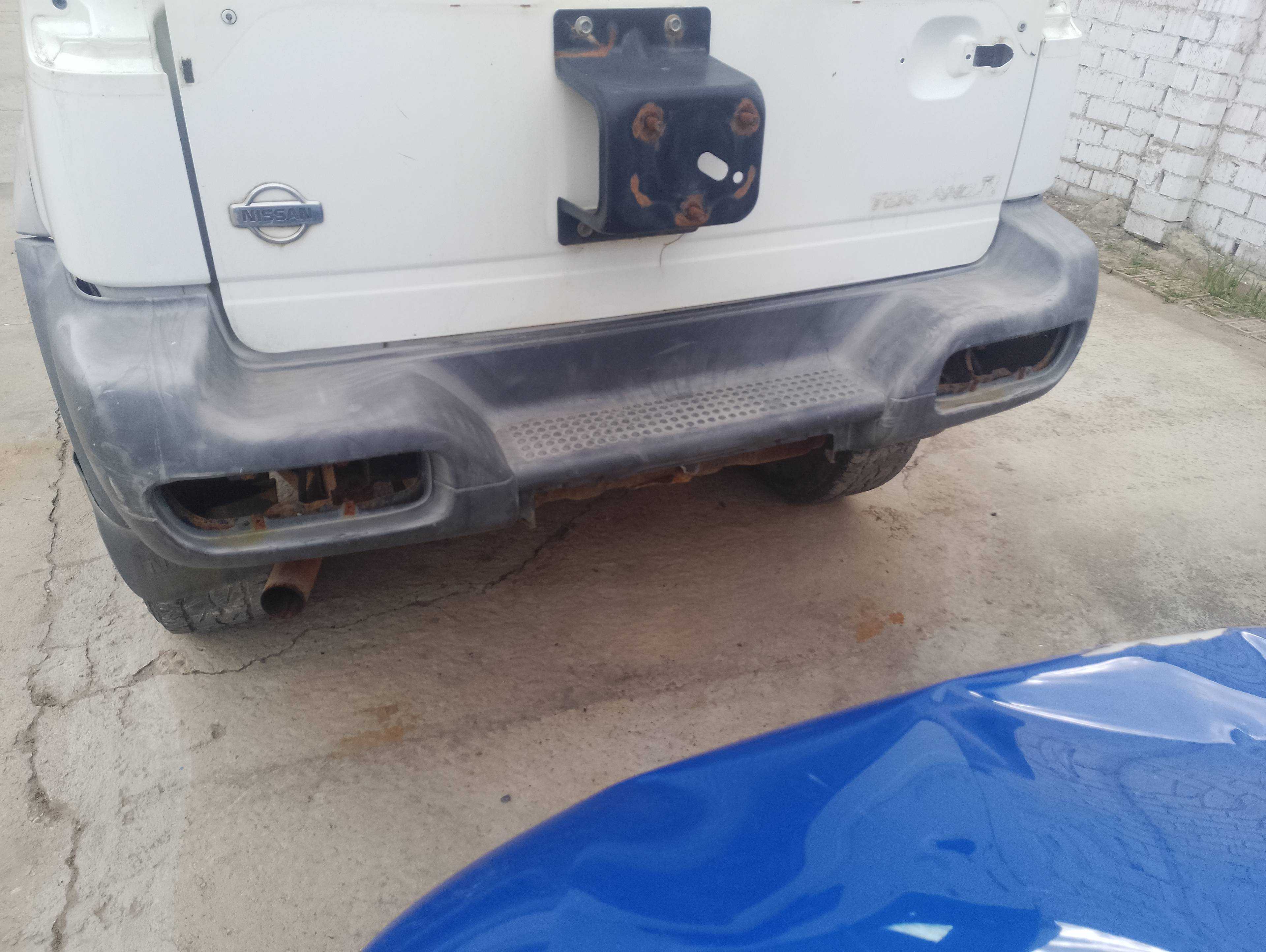 Recambio de paragolpes trasero para nissan terrano/terrano.ii (r20) avenue referencia OEM IAM   