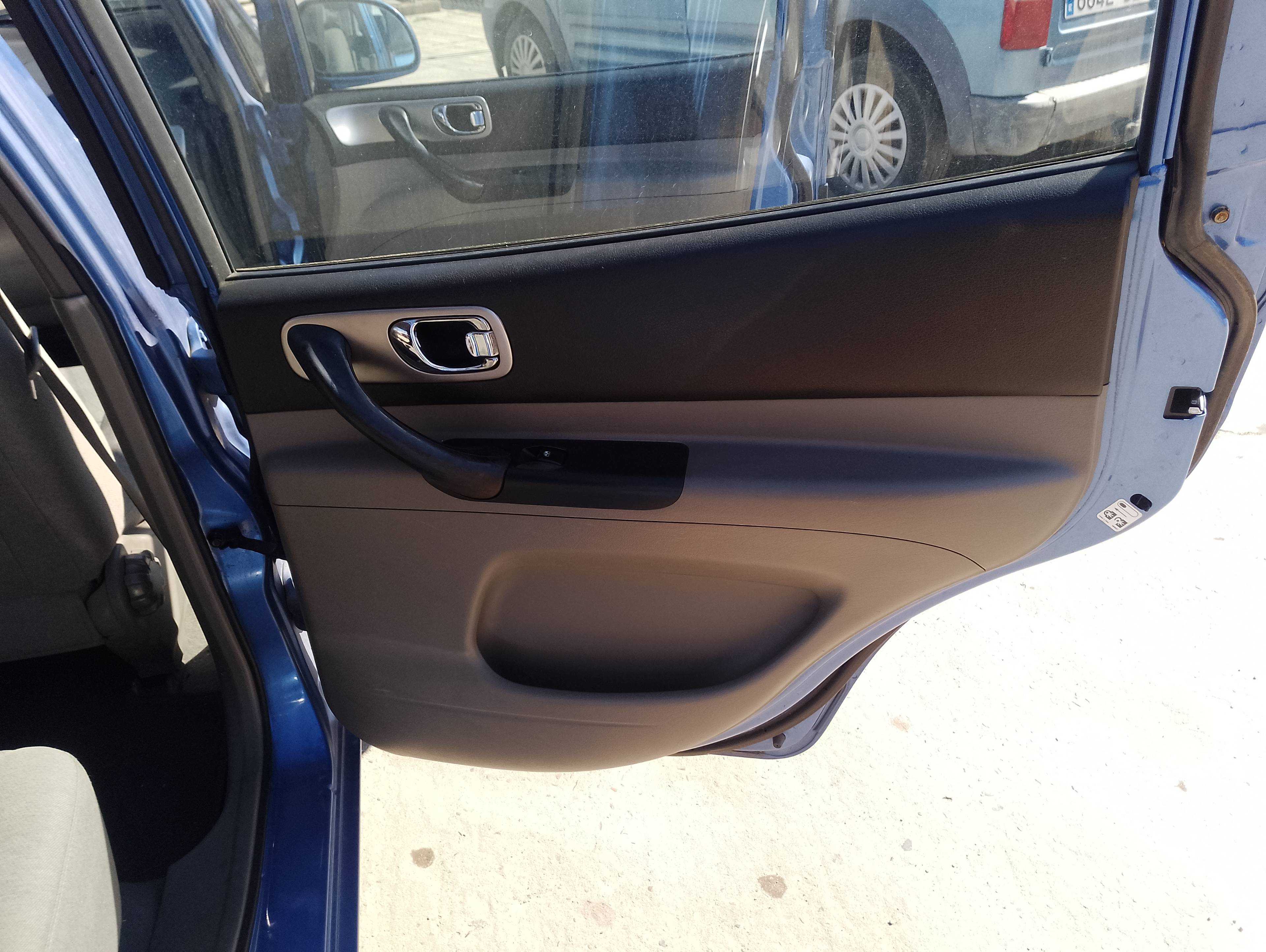 Recambio de guarnecido puerta trasera derecha para chevrolet tacuma se referencia OEM IAM   