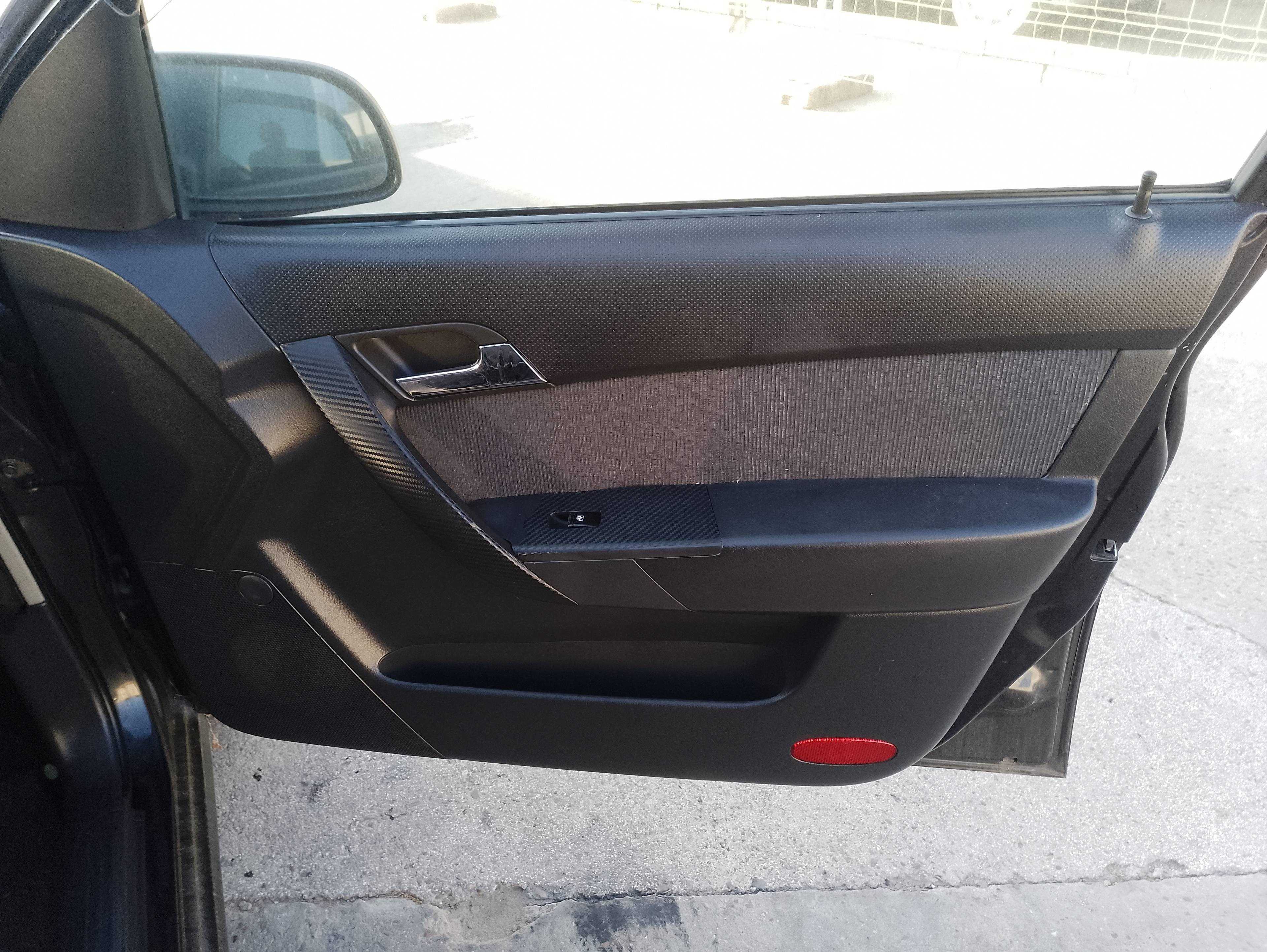 Recambio de guarnecido puerta delantera derecha para chevrolet aveo ls referencia OEM IAM   