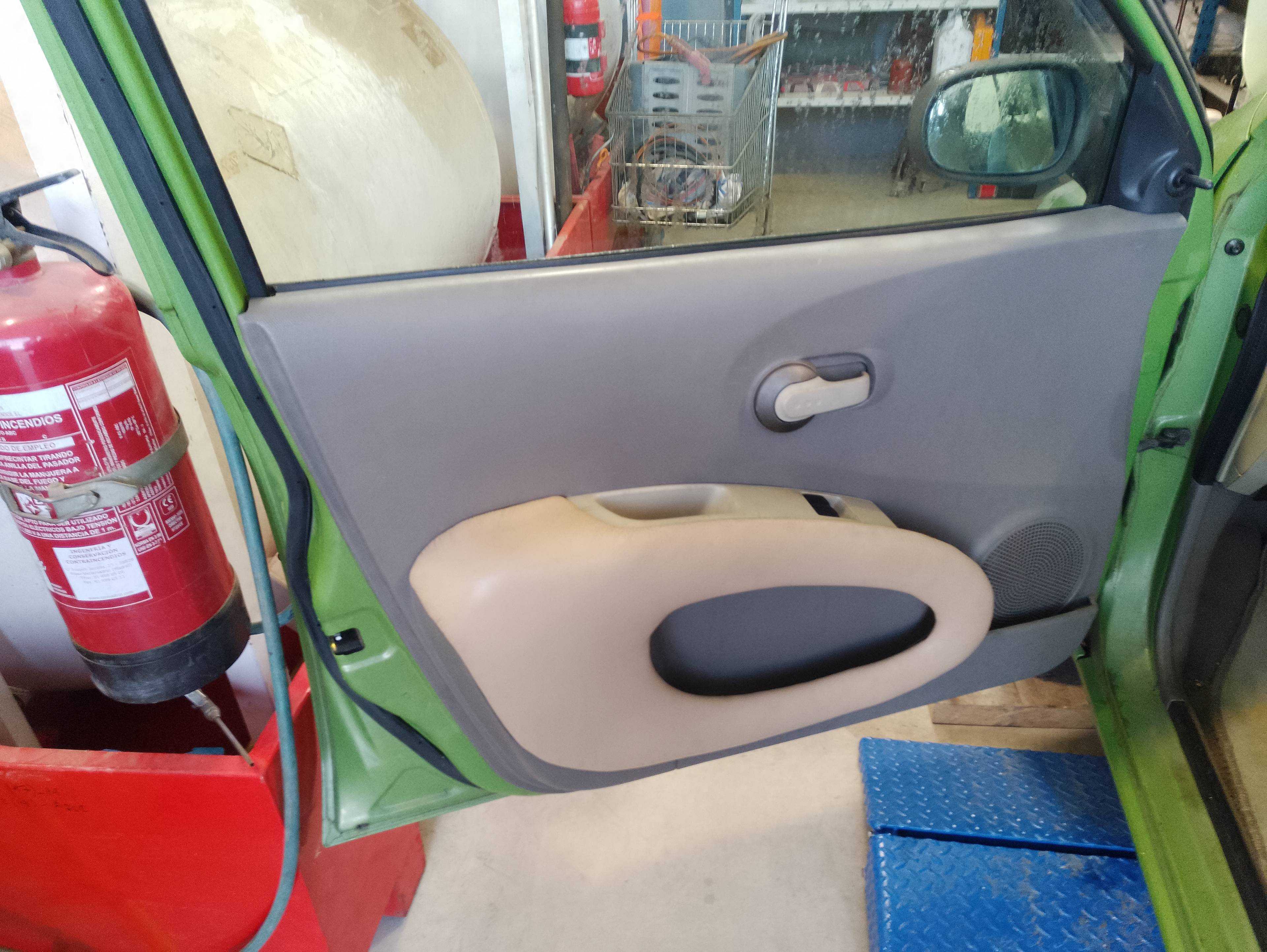 Recambio de guarnecido puerta delantera izquierda para nissan micra (k12e) acenta referencia OEM IAM   