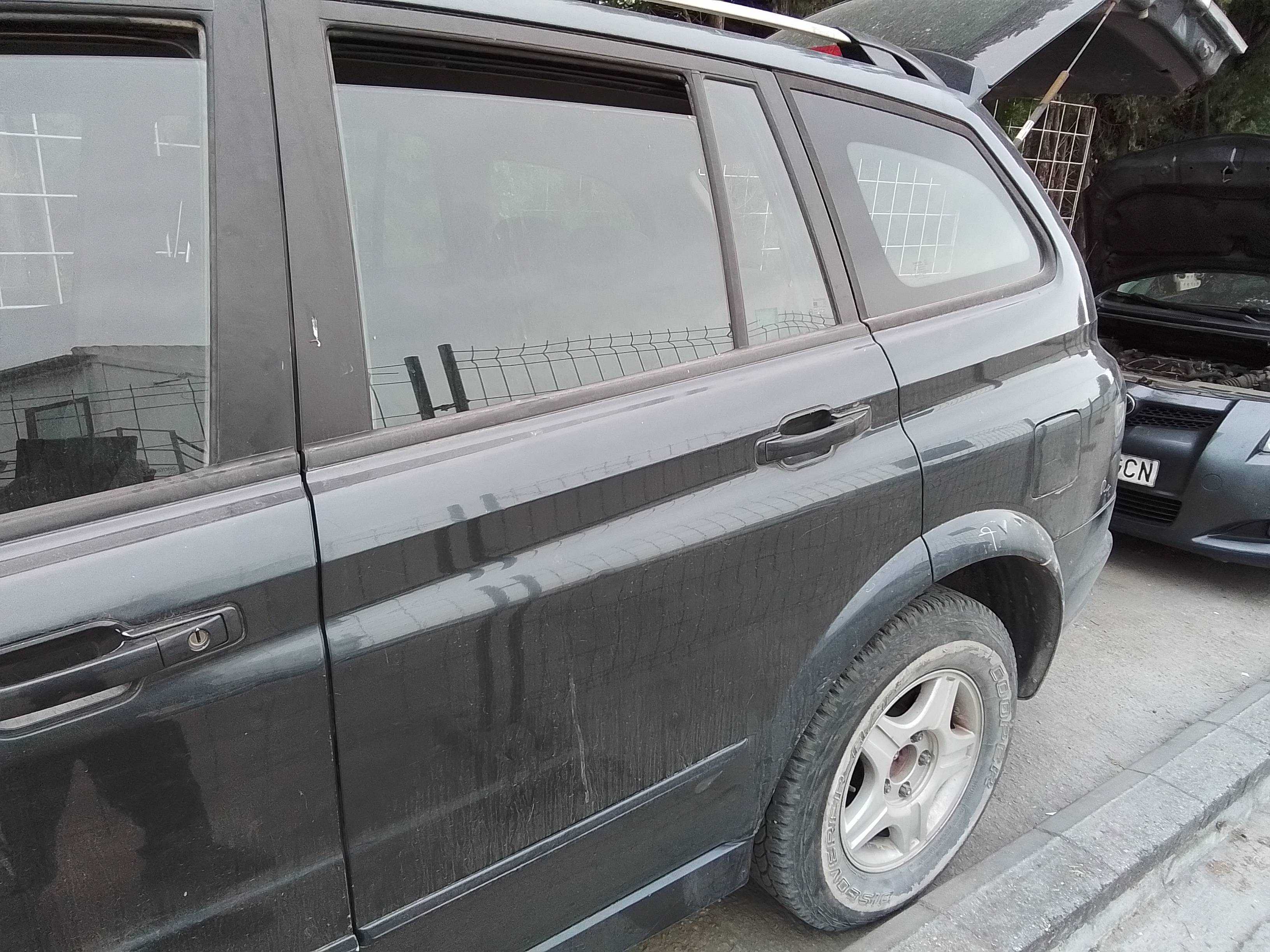 Recambio de puerta trasera izquierda para ssangyong kyron 2.0 referencia OEM IAM   